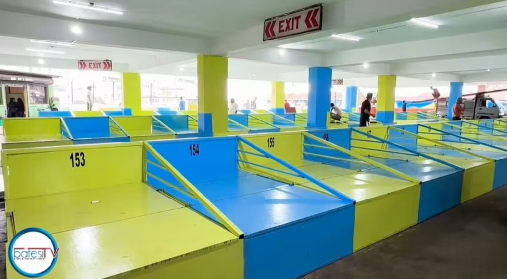 Khñium ki nongdie madan ha Parking Lot ka MUDA bym biang ka um, bording bad ka Fan